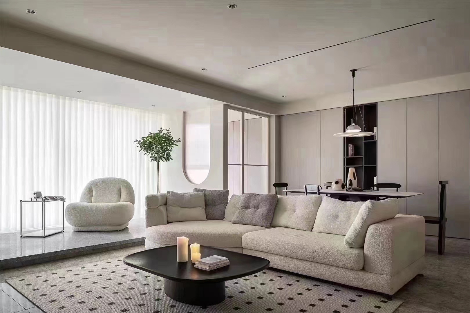 Transparent integrated living-dining area | Gentle curved soft furnishings soothe daily life